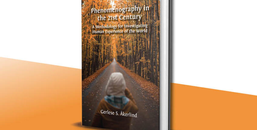 The cover of a book on phenomenography, showing a person standing looking down a road from behind. The road islined with trees and autumn leaves lie along its edges